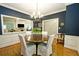 Inviting dining room features a round table and view into Gathering room at 3021 Margaret Mitchell Dr # 8, Atlanta, GA 30327