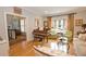Living room features hardwood floors, large windows, and comfortable seating at 3021 Margaret Mitchell Dr # 8, Atlanta, GA 30327