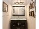 Modern bathroom with dark vanity and glass countertop at 3021 Margaret Mitchell Dr # 8, Atlanta, GA 30327