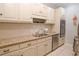 Spacious kitchen with granite countertops, stainless steel appliances, and white cabinets at 3021 Margaret Mitchell Dr # 8, Atlanta, GA 30327