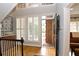 Spacious entryway with hardwood floors, built in shelving, and lots of natural light at 3021 Margaret Mitchell Dr # 8, Atlanta, GA 30327