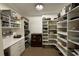 Large pantry with extensive shelving for kitchenware and food storage at 3021 Margaret Mitchell Dr # 8, Atlanta, GA 30327