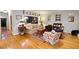 Light and airy living room with hardwood floors and access to hallway at 3021 Margaret Mitchell Dr # 8, Atlanta, GA 30327