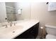 Clean bathroom with dark vanity, white countertop, and a shower/tub combo at 3021 Margaret Mitchell Dr # 8, Atlanta, GA 30327
