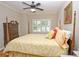 Bright bedroom with hardwood floors, plantation shutters, and a comfortable bed at 3021 Margaret Mitchell Dr # 8, Atlanta, GA 30327