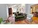 Sunroom with terracotta tile floor, comfy seating, and access to other rooms at 3021 Margaret Mitchell Dr # 8, Atlanta, GA 30327