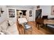 Living room with hardwood floors, built-in shelving, and comfortable seating at 3021 Margaret Mitchell Dr # 8, Atlanta, GA 30327