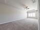 Spacious bedroom with ceiling fan and large windows at 222 Gallant Fox Way, Acworth, GA 30102