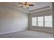Bright bedroom with ceiling fan and neutral color palette at 222 Gallant Fox Way, Acworth, GA 30102
