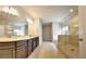 Elegant Primary bathroom with double vanity and large shower at 222 Gallant Fox Way, Acworth, GA 30102