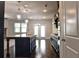 Kitchen with dark cabinetry, granite countertops, and large island at 222 Gallant Fox Way, Acworth, GA 30102