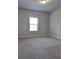 Spacious bedroom with neutral walls and carpet at 222 Gallant Fox Way, Acworth, GA 30102