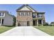 Beautiful two-story home with brick and siding at 222 Gallant Fox Way, Acworth, GA 30102