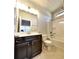 Full bathroom with tub shower combo and dark wood vanity at 222 Gallant Fox Way, Acworth, GA 30102