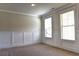 Bright office with neutral walls, carpeted floors, and wainscoting at 222 Gallant Fox Way, Acworth, GA 30102