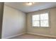 Bright bedroom with neutral walls and carpet at 222 Gallant Fox Way, Acworth, GA 30102