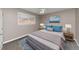 Main bedroom with grey carpeting, ceiling fan, and window coverings at 6314 Walker Rd, Riverdale, GA 30296