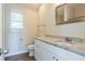 Clean bathroom, featuring granite countertop and updated vanity at 280 Green Commons Dr, Covington, GA 30016
