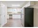 Modern kitchen featuring stainless steel appliances and granite countertops at 280 Green Commons Dr, Covington, GA 30016