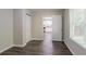 Bedroom with window, wood-look floors and closet at 280 Green Commons Dr, Covington, GA 30016