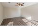 Spacious bedroom with ceiling fan and hardwood floors at 280 Green Commons Dr, Covington, GA 30016