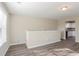 Bright living room features hardwood floors and an open concept layout at 280 Green Commons Dr, Covington, GA 30016