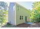 Gray vinyl sided home with a small patio at 280 Green Commons Dr, Covington, GA 30016