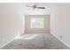 Spacious main bedroom with high ceiling and large window at 280 Green Commons Dr, Covington, GA 30016