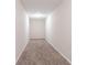 Spacious bedroom with neutral walls and brown carpet at 280 Green Commons Dr, Covington, GA 30016
