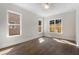 Spacious bedroom with hardwood floors and large windows at 912 Sunny Meadows Ln, Marietta, GA 30062