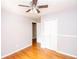 Spacious bedroom with hardwood floors and closet at 7267 Wildflower Walk, Winston, GA 30187