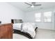 Bright bedroom with ceiling fan, neutral walls and carpet at 1639 Winpost Nw Ln, Atlanta, GA 30318