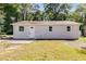 Newly renovated home with large windows and a grassy yard at 6085 Hotel St, Austell, GA 30106