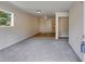 Spacious living room with gray carpet and access to kitchen at 6085 Hotel St, Austell, GA 30106