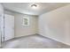 Well-lit bedroom featuring carpet and a closet at 6085 Hotel St, Austell, GA 30106