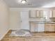 Modern kitchen with light wood cabinets and granite counters at 6085 Hotel St, Austell, GA 30106