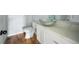 Stylish bathroom with vessel sink and hardwood floor at 1630 Ezra Church Nw Dr, Atlanta, GA 30314
