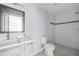 Clean bathroom with vanity, toilet and shower at 1630 Ezra Church Nw Dr, Atlanta, GA 30314