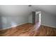 Spacious bedroom with hardwood floors and access to bathroom at 1630 Ezra Church Nw Dr, Atlanta, GA 30314