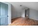 Charming bedroom featuring hardwood floors and gray walls at 1630 Ezra Church Nw Dr, Atlanta, GA 30314
