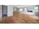 Bright living room featuring hardwood floors and a modern fireplace at 1630 Ezra Church Nw Dr, Atlanta, GA 30314