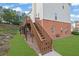 Home exterior with stairs leading to deck at 5989 Turfway Park Ct, Sugar Hill, GA 30518