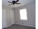 Spacious bedroom with neutral walls, new carpet and ample closet space at 115 Mcferrin Pl, Riverdale, GA 30274