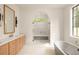 Bathroom with a walk-in shower and soaking tub at 8350 Farmette Bnd, Chattahoochee Hills, GA 30268