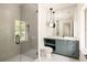 Modern bathroom with gray vanity and walk-in shower at 8350 Farmette Bnd, Chattahoochee Hills, GA 30268