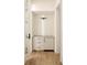 Built-in butler's pantry with marble countertop and cabinetry at 8350 Farmette Bnd, Chattahoochee Hills, GA 30268
