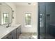 Modern bathroom with marble vanity and hexagon tile floor at 8350 Farmette Bnd, Chattahoochee Hills, GA 30268