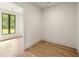 Bright office space featuring hardwood floors and large windows at 8350 Farmette Bnd, Chattahoochee Hills, GA 30268