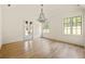 Spacious bedroom with hardwood floors and French doors at 8350 Farmette Bnd, Chattahoochee Hills, GA 30268