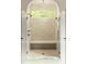 Walk-in shower with herringbone tile and built-in bench at 8350 Farmette Bnd, Chattahoochee Hills, GA 30268